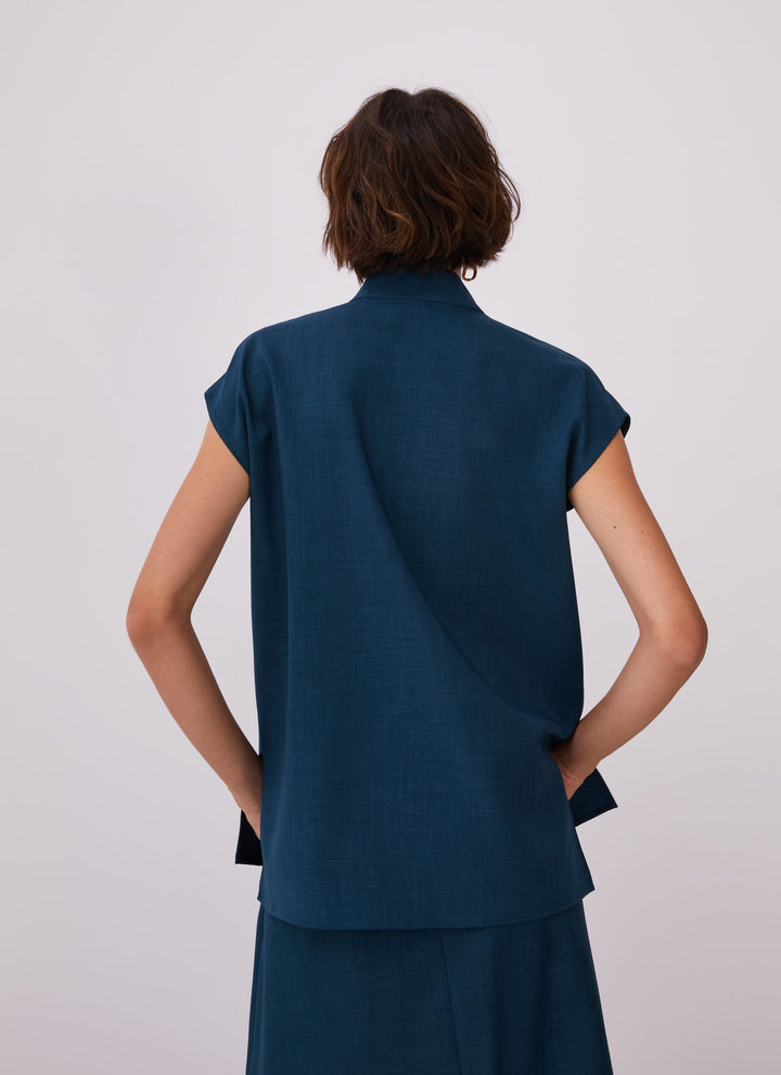 Women Short Sleeved Shirt | Blue High Collar Blouse With Flap by Spanish designer Adolfo Dominguez