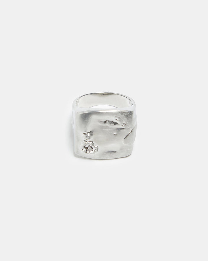 Women Ring | Silver Seal Ring With Engraved Flower by Spanish designer Adolfo Dominguez